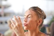 You must drink at least 8 oz. glasses of water every day. (Photo via Pexels/Adrienn)